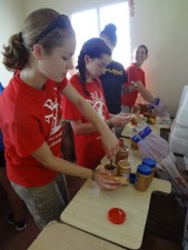 Dom Repub - Mariah & Maggie making lunch for fire victims