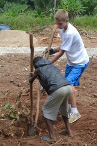 Ghana Wyatt Combs works with local